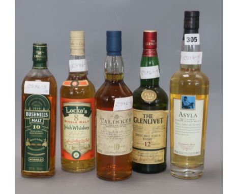 Five bottles of whisky: Talisker Malt, Bushmills Irish Malt, The Glenlivet, Asyla blended Scotch Whisky and Locke's Irish Whi