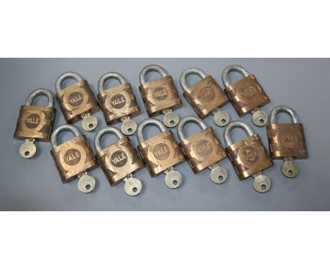 Eleven vintage Yale padlock and keys