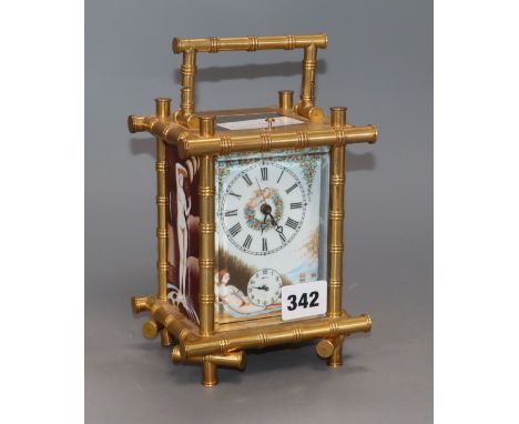 A Chinese reproduction enamel bamboo carriage clock