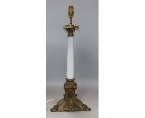A Victorian gilt metal and glass lamp height 48cm
