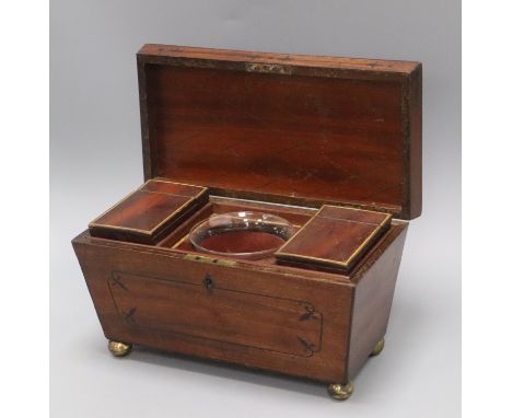 A Regency mahogany sarcophagus tea caddy