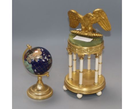 An onyx and gilt metal portico desk piece and hardstone globe