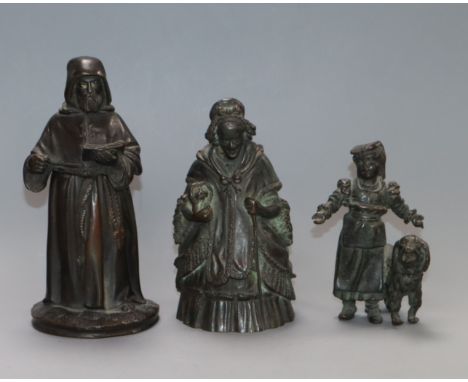 A bronze bell, a bronze monk and a child with a dog tallest 13cm