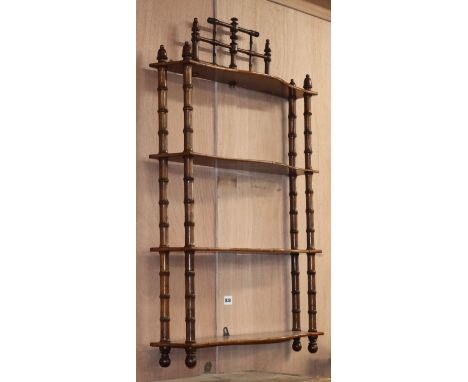 A Victorian cherry faux bamboo wall bracket W.60cm