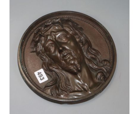 A bronze roundel of Christ