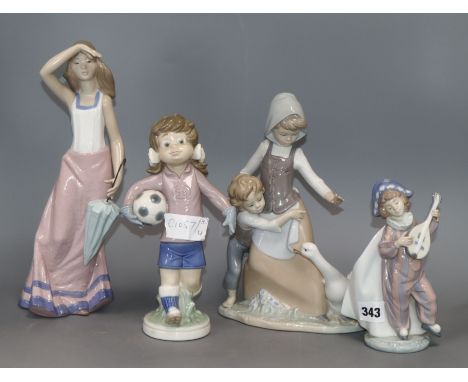 Three Lladro figure groups and a Nao figure