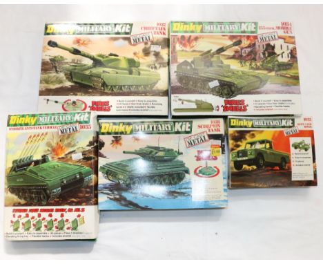 Five Dinky diecast metal Military Action Kits including 1032 Army Land Rover, 1034 155mm Mobile Gun, 1035 Striker Anti-Tank V