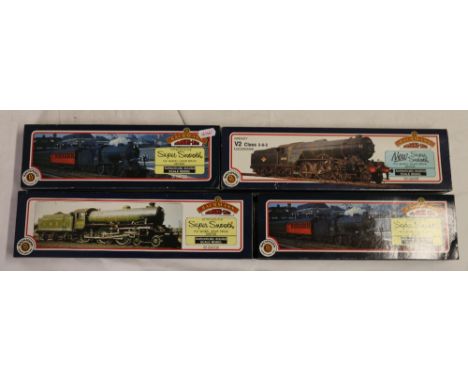 Four Bachmann Branchline OO gauge model railway locomotives including 31700 4-6-0 tender locomotive 1264 LNER green, 31852 0-