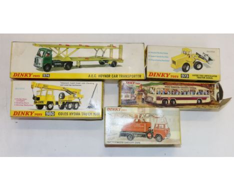 Five Dinky Toys including 952 Vega Major Luxury Coach, 970 Jones Fleetmaster Cantilever Crane, 973 Eaton Yale Articulated Tra