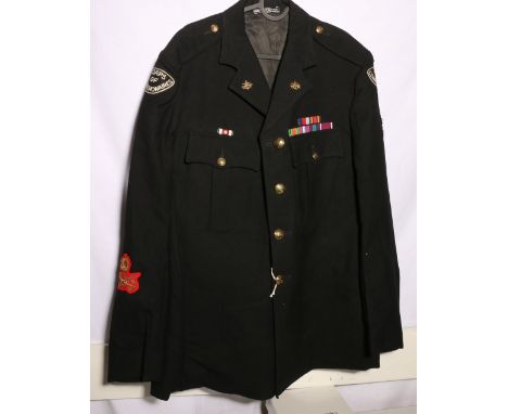 Corps of Commissionaires dress uniform black jacket with Pipe and McGill Ltd label with Corps of Commissionaires arm badges, 