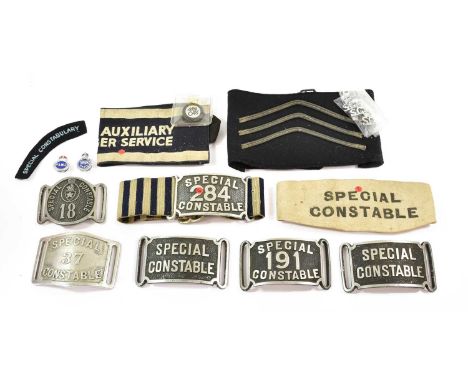 Police Related Items, comprising a Police Auxiliary Messenger Service armband and two enamelled chrome lapel badges, one stam