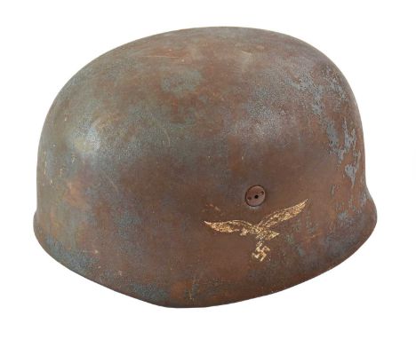 A Museum Copy of a German Luftwaffe Paratrooper's Helmet, the distressed blue steel skull with double decals, cushioned leath