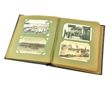 An Imperial German Postcard Album, containing approximately two hundred postcards relating to the First World War, real photo