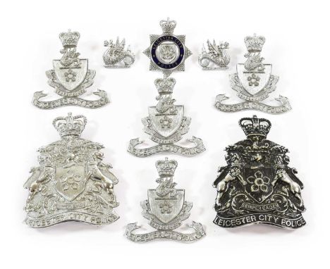 Leicester City Police:- two helmet plates in die stamped white metal, one chrome and one blackened, each with QEII crown over