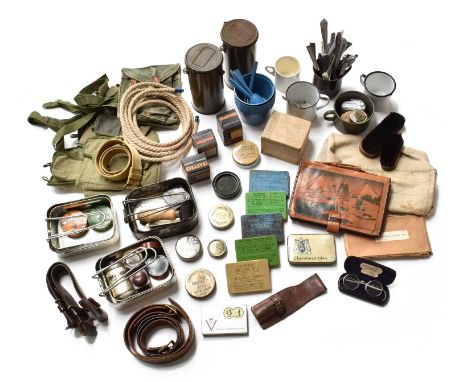 A Quantity of Second World War British Army Equipment, including three tins of dubbing, a brass bed plate to the Green Howard
