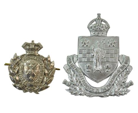 A Victorian Stirling County Constabulary Kepi Badge, in die stamped white metal with QVC over wreath, garter and coat of arms