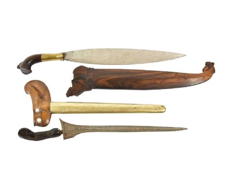 A Javanese Kris, with 35cm straight pamor steel blade, beaded white metal mendak,wood hilt and German silver plain pendok wit