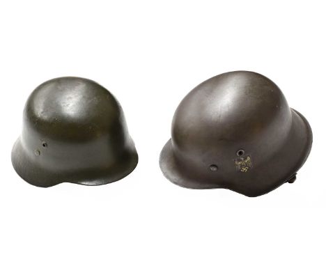 A German M40 Army Helmet, the green skull with later decal, the inner brim inscribed Fink, the inner crown with stencil mark 