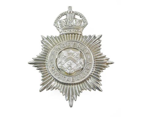 An Anglesey Constabulary Helmet Plate, in die stamped white metal, with King's crown over star, circlet and applied chrome co