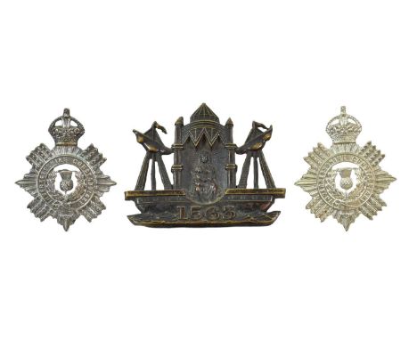 A Pre-1920 Leith Borough Police Helmet Plate, in die stamped bronzed brass, numbered 1563, with three fixing lugs; two Invern