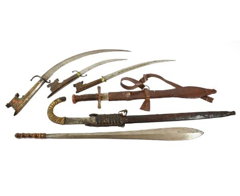A Maasai Seme, the 59cm leaf shape steel blade with raised medial ridge and with ribbed leather bound grip, lacks scabbard, 7