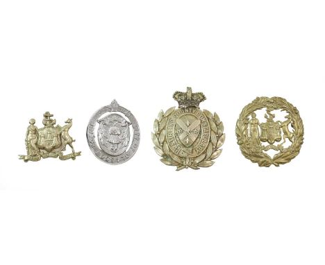 A Victorian Stirling County Constabulary Helmet Plate, in die stamped white metal with QVC over wreath, garter and coat of ar