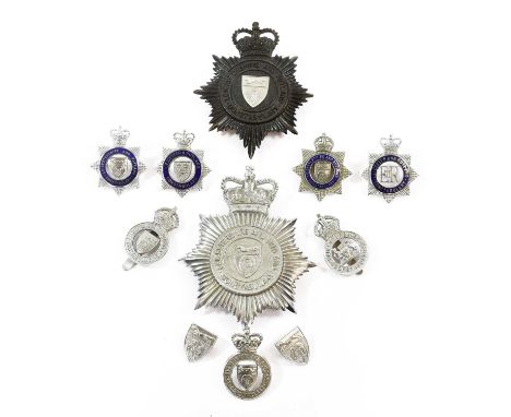 Leicestershire and Rutland Constabulary:- two helmet plates in die stamped white metal, each with QEII crown over star, circl