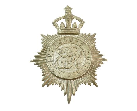 A Johannesburg Police Helmet Plate, in die stamped white metal with Imperial type crown over star, circlet and ER monogram, w