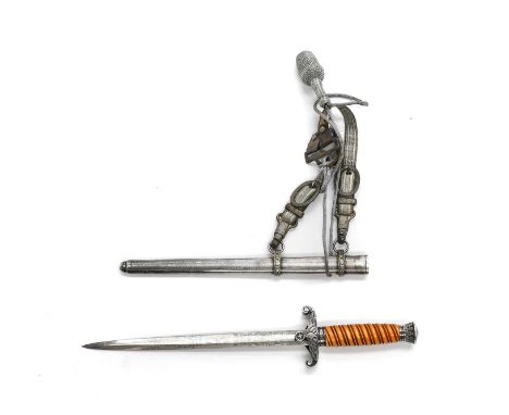 A Second World War German Army Officer's Dagger, the unsigned 25.5cm double edge steel blade etched with eagle, scrolling ten