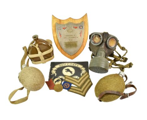 A Small Quantity of Second World War Militaria, comprising a German gas mask, the base stamped FE37 AM and dated 1940; two Ge