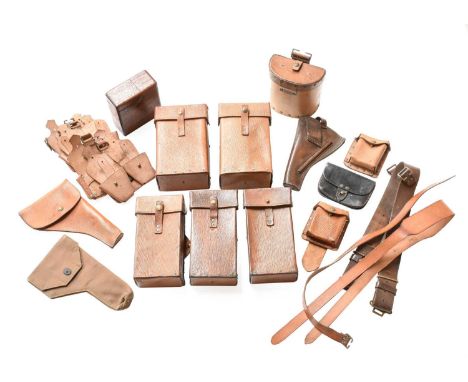 Militaria, including crushed leather ammunition pouches, magazine cases, pistol holster, straps, a pair of Arctic white cotto
