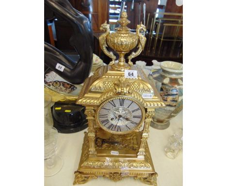 A French gilt over mantle clock