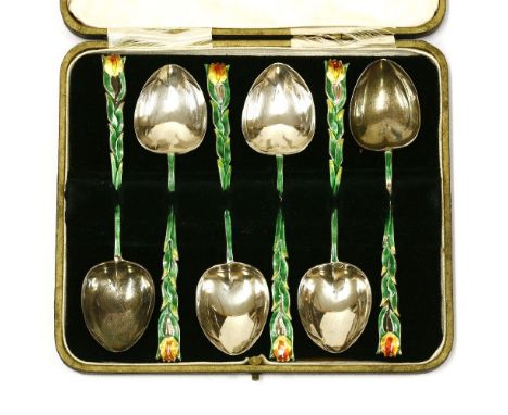 A set of six silver and enamel teaspoons,William Gallimore &amp; Sons, Sheffield, 1930,the stems modelled as flowers,11.2cm l