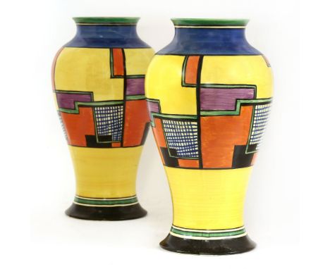 A pair of Clarice Cliff 'Football' meiping vases, each with geometric painted decoration in yellow, orange, green, purple and