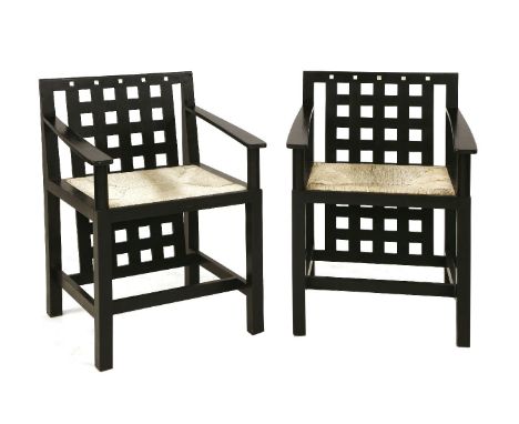 A pair of modern Cassina DS3 chairs,after a design by Charles Rennie Macintosh, with mother-of-pearl details and rush seats, 