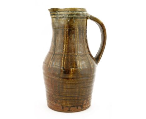 *Mike Dodd (b.1943),a stoneware jug with vertical combed details, impressed 'MD' initial seal,32.5cm high*Artist's Resale Rig