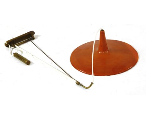 An Italian brass and enamelled wall lamp,with an hinged bracket, a rise/fall weight,shade 49cm diameter