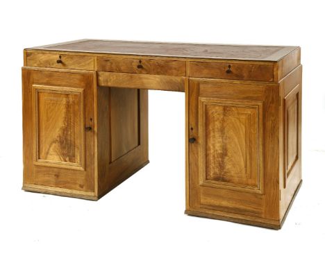A walnut pedestal desk, by Edward Barnsley (1900-1987), 1937, for Captain J R Abbey (1894-1969), the red leather top over thr