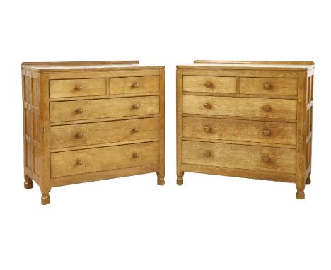 Two matched Robert 'Mouseman' Thompson oak chests of drawers,each with two short and three long drawers, each with the mouse 