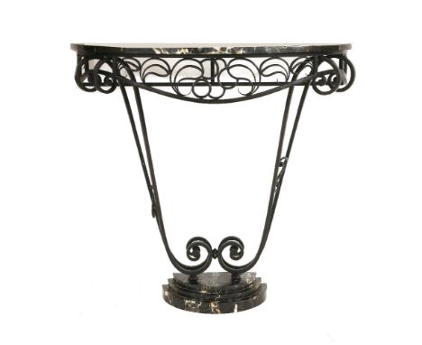 An Art Deco wrought iron and Portoro marble console table, the demilune marble top over an openwork apron, raised on scrollin