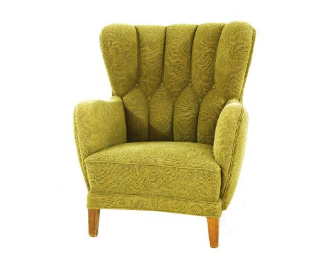 A Danish green upholstered armchair, with a button back