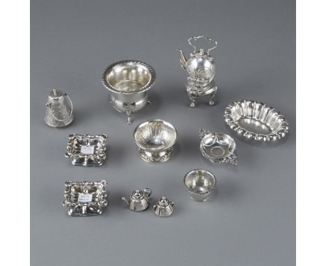 Miniature sterling silver tea service, comprised of eleven pieces. Dimensions: 2 1/4th in. (H) x 2 3/4th in. Weight: 9 Troy o