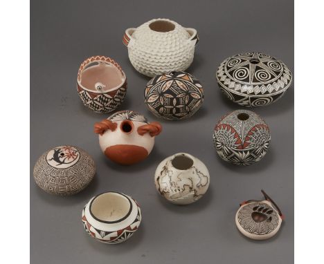 Group of ten Acoma pottery pieces that includes one M. Augustine circular vessel, one Slyvia Naha seed pot, two Sheila Hinsha