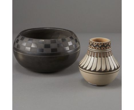 Two Blue Corn (Crucita Gonzales Calabaza) (1921-1999) San Ildefonso and Santa Clara blackware pottery jar in globular form wi