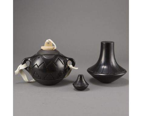 Two Jeff Roller (Santa Clara Pueblo, b. 1963) Santa Clara blackware pottery vases. The vase has a squat, wide body with cylin