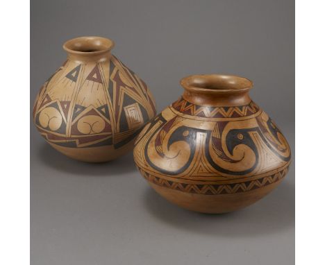 Two large Mata Ortiz polychrome pottery jars in globular forms with flaring top and decorative geometric elements along the b