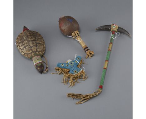 Four beaded Native American objects, including a ceremonial dance stick for the Buffalo dance from the Sioux people, a turtle