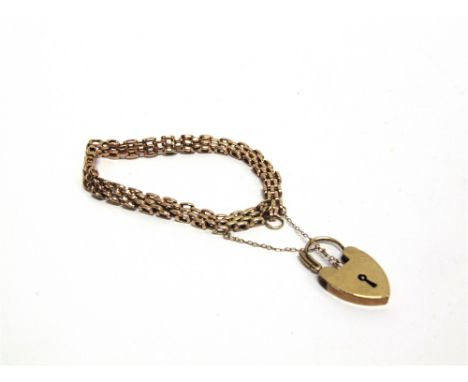 A BRACELET OF THREE BAR GATE LINKS to a padlock clasp, approximately 15g gross