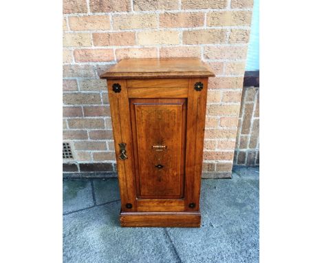 A VICTORIAN WALNUT POT CUPBOARD  with fielded panel door and painted decoration, 42cm wide 44cm deep 78cm high