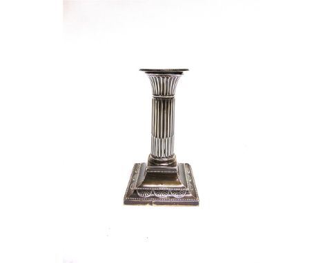 A SINGLE SILVER LATE VICTORIAN DESK CANDLESTICK  by William Hutton & Sons Ltd, London 1896, 14cm high